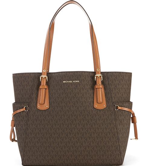 signature michael kors tote|Michael Kors voyager signature tote.